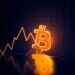 Bitcoin symbol beside a cooling inflation chart representing softer PCE data