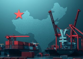 Cargo shipping containers and port cranes representing China trade surplus and global macro