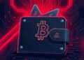 Bitcoin hardware wallet with security breach warning representing the Coldcard exploit