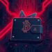 Bitcoin hardware wallet with security breach warning representing the Coldcard exploit