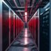 Rows of Bitcoin mining servers in a data center under power grid restrictions