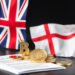 US and UK flags with digital stablecoin coins representing joint financial regulation talks