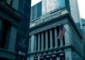 Traditional stock exchange imagery merging with crypto, representing a Nasdaq-Kraken partnership
