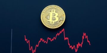 Bitcoin coin above a declining US Treasury bond yield chart